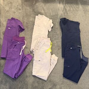 3 Sets of Figs Scrub Pants in Purple, khaki and Navy, all sized XXS